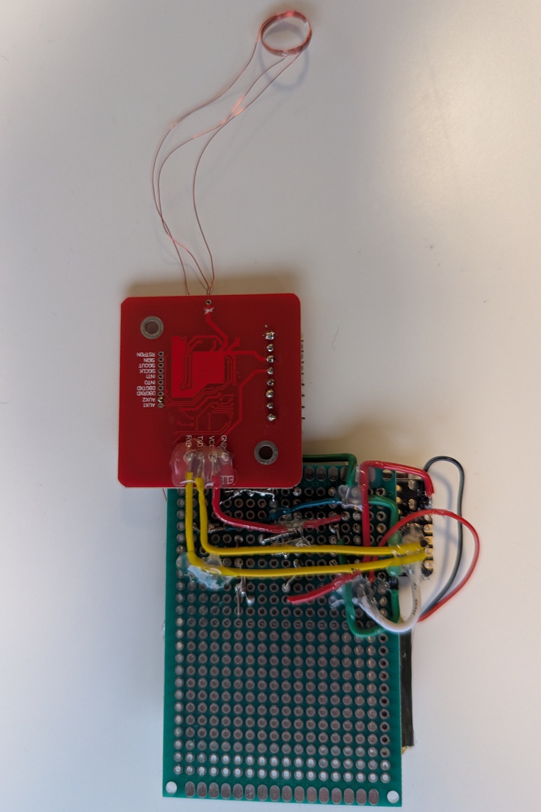 Back of the wearable, showing the wiring between the NFC reader and the protoboard