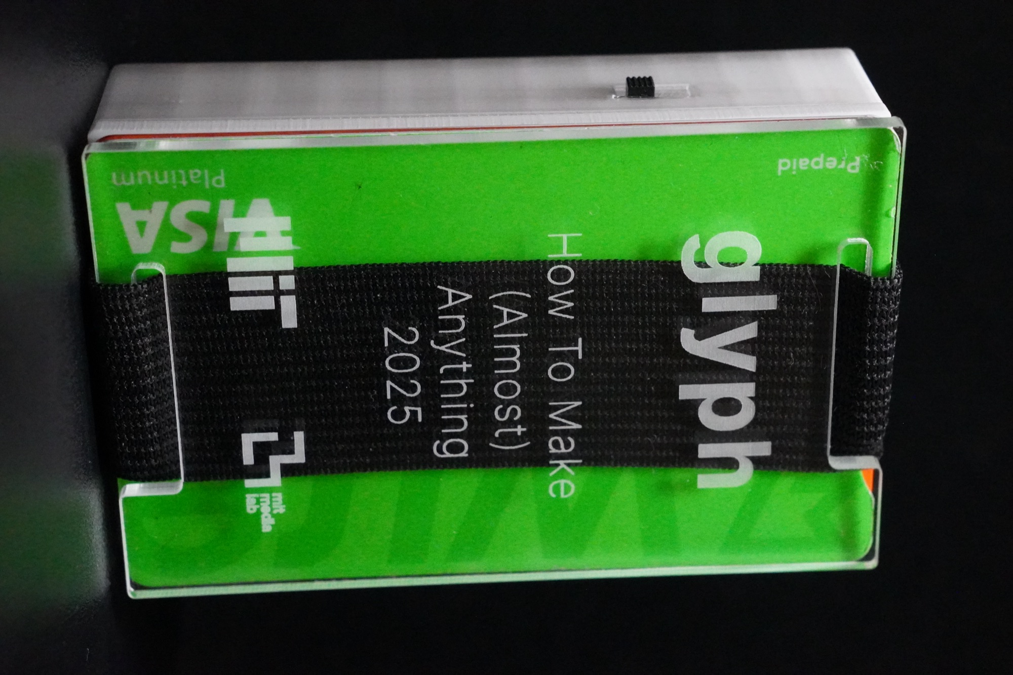 Back of the Glyph wallet, holding a transit card and ID